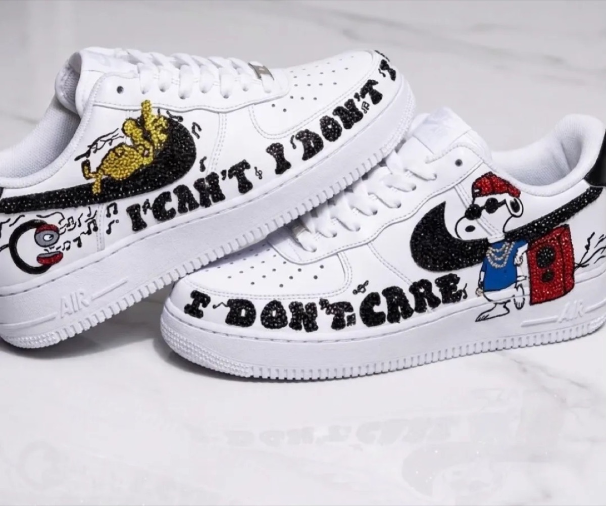 Crystal-work beagle customs with hand-set lettering across the swoosh